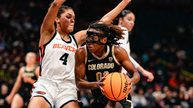 Jaylyn Sherrod drives against Oregon State